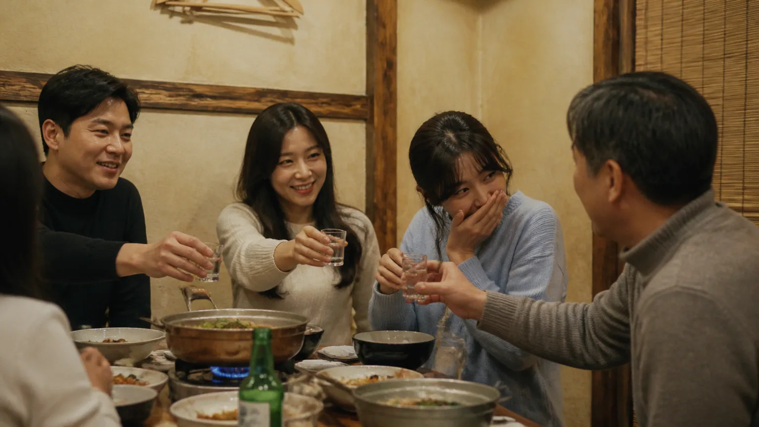 People clinking soju glasses in a toast (웹 검색 실패 - AI 대체 장면)