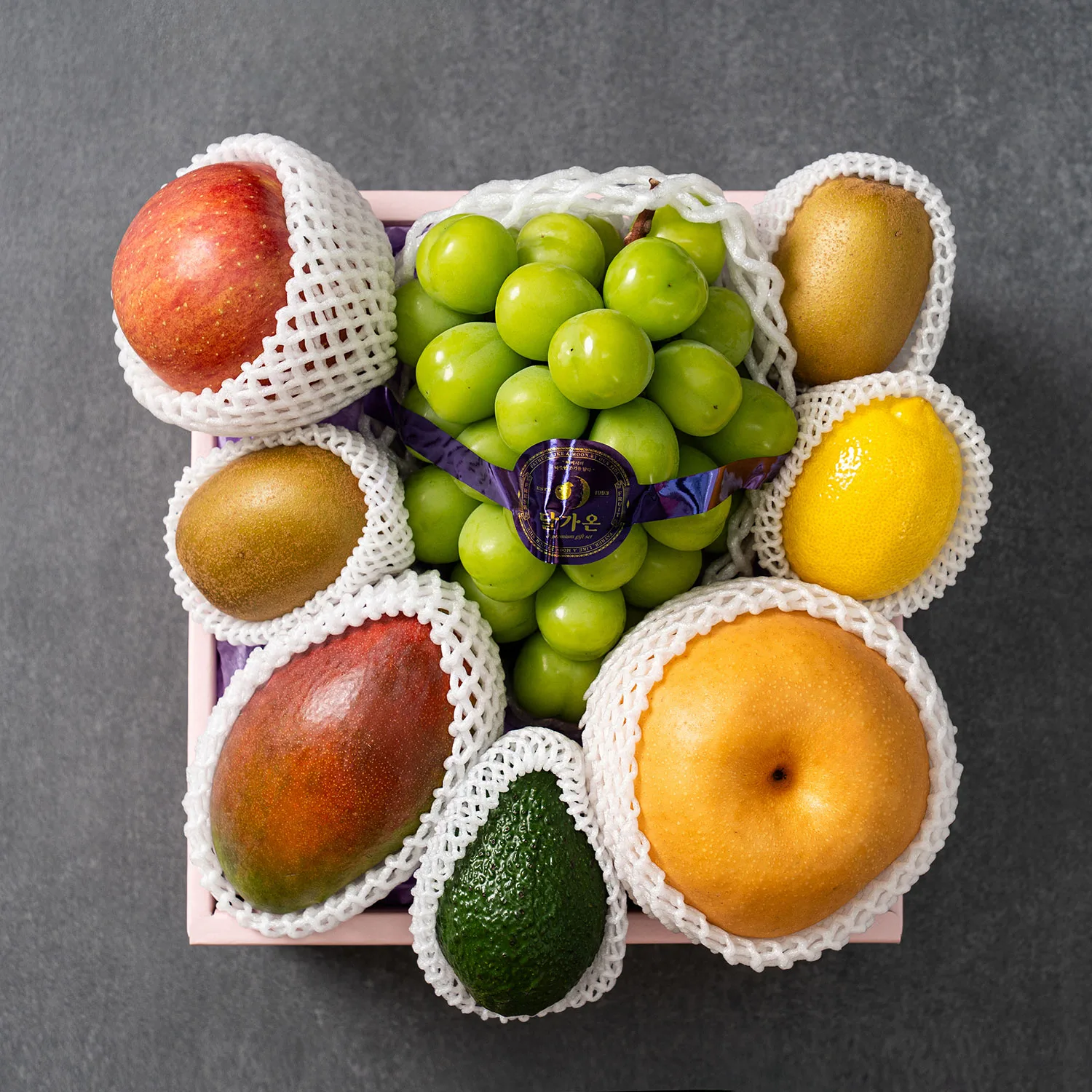 A well-wrapped gift box of fruit and food