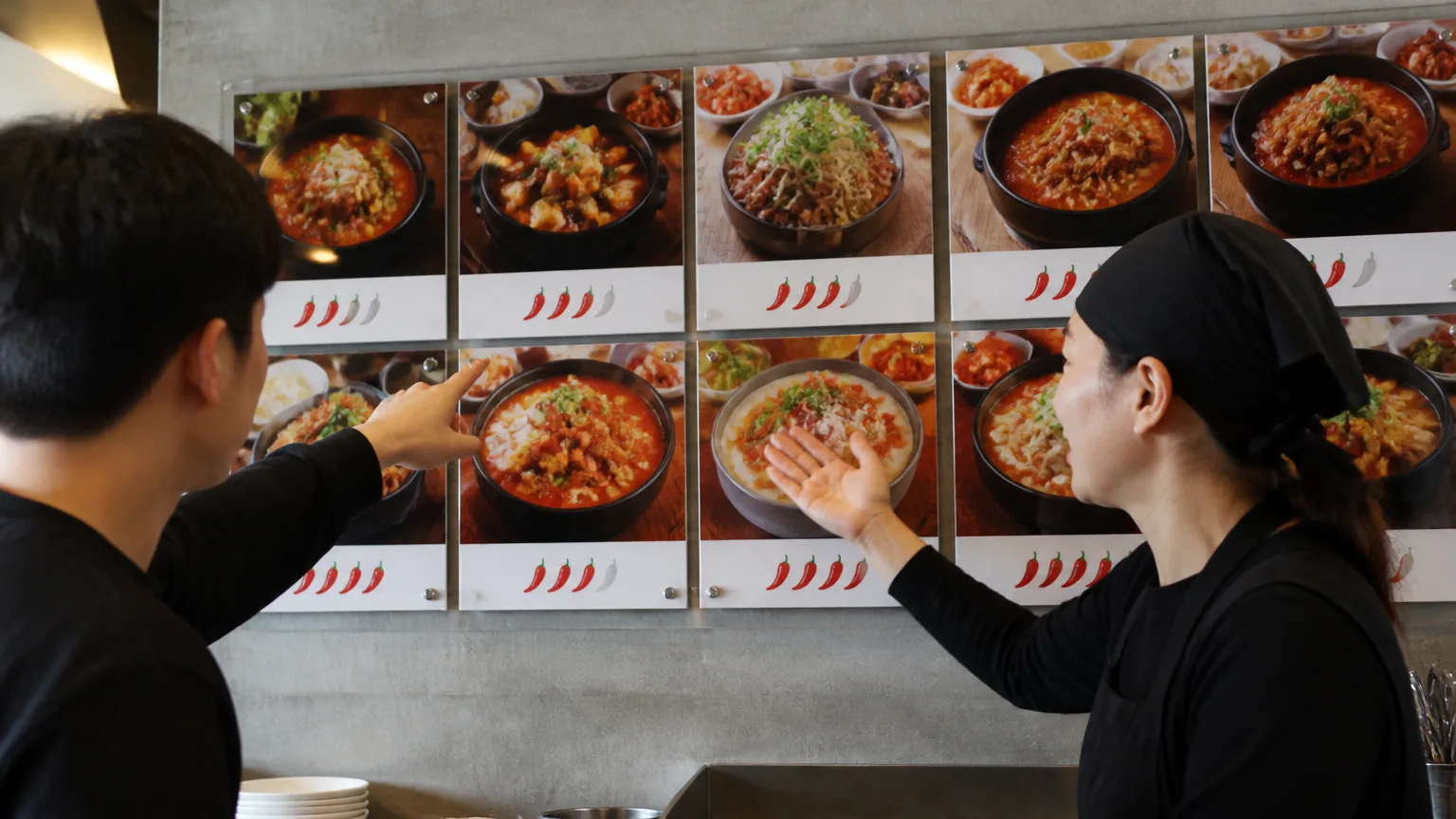Korean restaurant menu with spice level chili icons