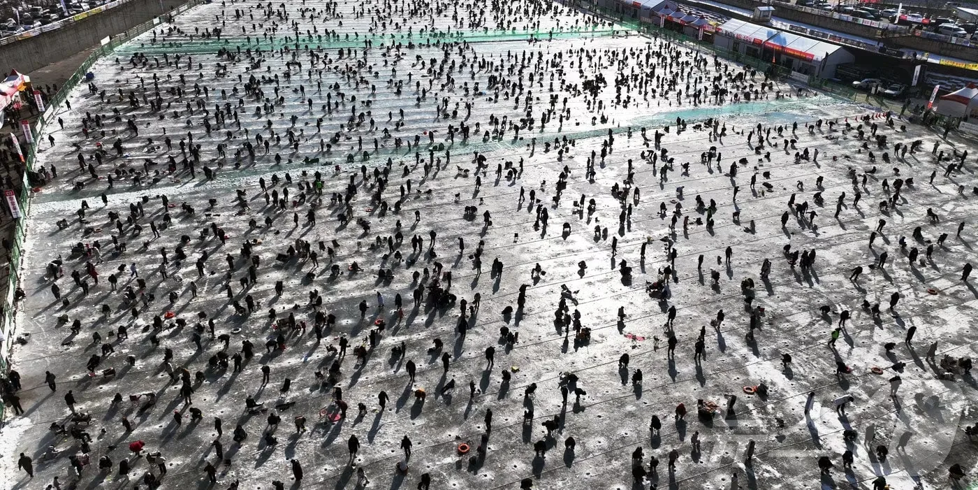 A child ice fishing at the Hwacheon Sancheoneo Ice Festival. Photo: Yonhap News